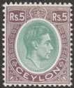 Click for more photos and details Ceylon 1943 KGVI 5r Green and Pale Purple Ordinary Paper Mint SG397a