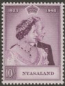 Click for more photos and details Nyasaland 1948 KGVI Royal Silver Wedding 10sh Mauve Mint SG162 cat £18