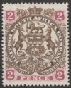 Click for more photos and details Rhodesia 1897 BSAC Large Arms 2d Brown and Mauve Mint SG68