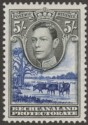 Click for more photos and details Bechuanaland Protectorate 1946 KGVI 5sh Grey-Black + Dp Ultramarine Mint SG127a