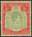 Click for more photos and details Bermuda 1944 KGVI 5sh Dull Green and Red on Pale Yellow p14 Mint SG118e cat £45