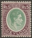 Click for more photos and details Ceylon 1938 KGVI 5r Green and Sepia-Brown Chalky Paper Mint SG397