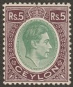 Ceylon 1938 KGVI 5r Green and Sepia-Brown Chalky Paper Mint SG397