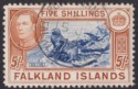 Click for more photos and details Falkland Islands 1938 KGVI 5sh Indigo + Pale Yellow-Brown Used SG161b PERF STAIN