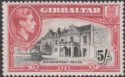 Click for more photos and details Gibraltar 1938 KGVI 5sh Black and Carmine Perf 14 Mint SG129 cat £110