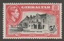 Click for more photos and details Gibraltar 1938 KGVI 5sh Black and Carmine Perf 13½ Mint SG129a