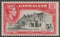 Click for more photos and details Gibraltar 1944 KGVI 5sh Black and Carmine Perf 13 Mint SG129b cat £42
