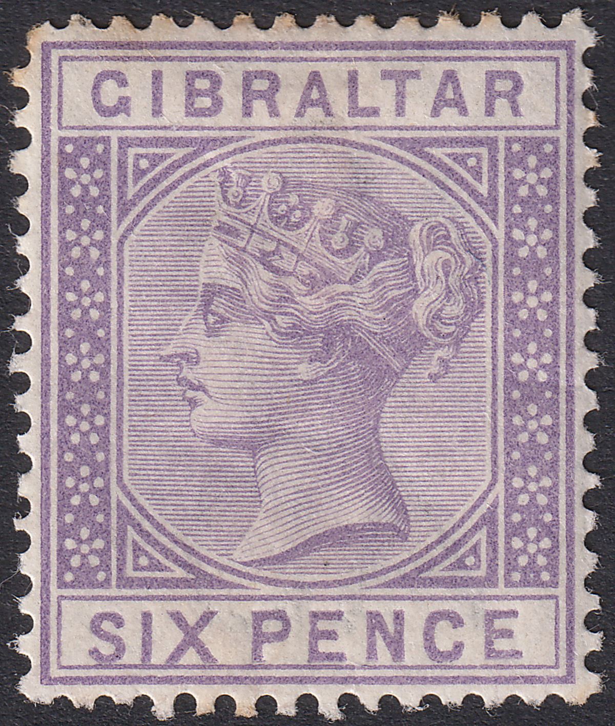 Gibraltar 1887 QV 6d Lilac Mint SG13 cat £140 toned perfs