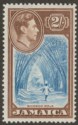 Click for more photos and details Jamaica 1938 KGVI 2sh Blue and Chocolate Mint SG131