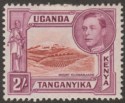 Click for more photos and details Kenya Uganda Tanganyika 1939 KGVI 2sh Lake-Brown + Dull Purple p13¼ Mint SG146v