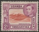 Click for more photos and details Kenya Uganda Tanganyika 1944 KGVI 2sh Lake-Brn + Brn-Purple p13¾x13¼ Mint SG146b