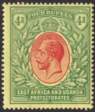 Click for more photos and details East Africa Uganda 1912 KGV 4r Red and Green on Yellow Mint SG56 cat £65