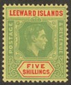 Click for more photos and details Leeward Islands 1951 KGVI 5sh Bright Green and Bright Red on Yellow Mint SG112c