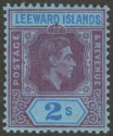 Click for more photos and details Leeward Islands 1943 KGVI 2sh Reddish Purple + Blue on Blue Ordinary Mint SG111a