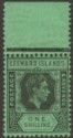 Leeward Islands 1942 KGVI 1sh Black and Grey on Emerald Ordinary Mint SG110bb