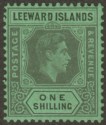 Click for more photos and details Leeward Islands 1942 KGVI 1sh Grey and Black on Emerald Ordinary Mint SG110ba