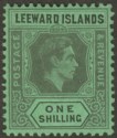 Click for more photos and details Leeward Islands 1942 KGVI 1sh Grey and Black on Emerald Ordinary Mint SG110ba