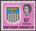 Click for more photos and details Northern Rhodesia 1963 QEII Arms 10sh Bright Magenta SG87 cat £30