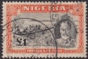 Click for more photos and details Nigeria 1936 KGV Canoe Pulling £1 Black and Orange Used SG45 cat £250