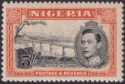 Click for more photos and details Nigeria 1938 KGVI 5sh Black and Orange perf 13x11½ Mint SG59 cat £110