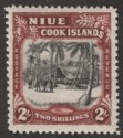 Click for more photos and details Niue 1938 KGVI Village 2sh Black and Red-Brown wmk Single Mint SG76