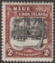 Click for more photos and details Niue 1938 KGVI Village 2sh Black and Red-Brown wmk Single Mint SG76