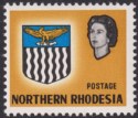 Click for more photos and details Northern Rhodesia 1963 QEII Arms 9d Value Omitted Variety Mint SG81a cat £750