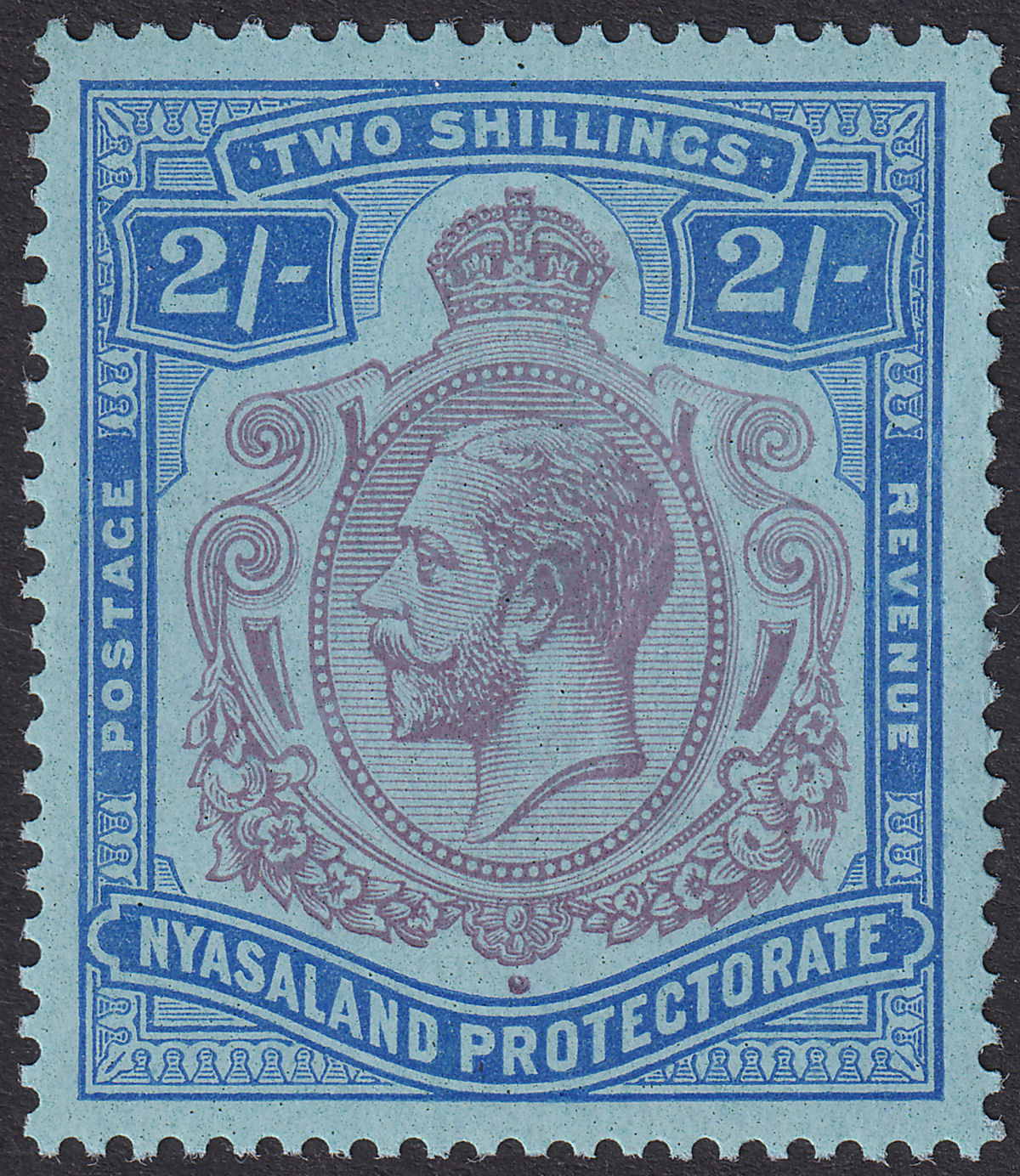 Nyasaland 1926 KGV 2sh Purple and Blue w Damaged Leaf Var Mint SG109f cat £200