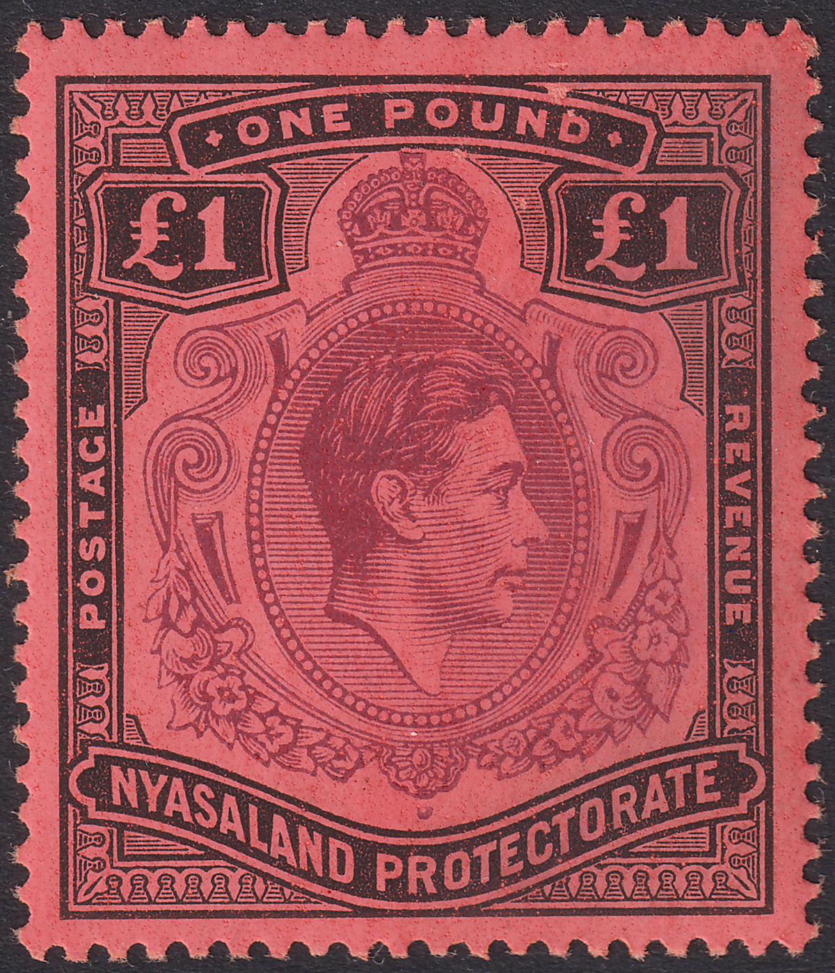 Nyasaland 1938 KGVI £1 Purple and Black Mint SG143 cat £65 Surface Scrapes