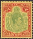 Click for more photos and details Nyasaland 1938 KGVI 5sh Pale Green and Red Chalky Paper Mint SG141 cat £55