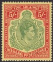 Click for more photos and details Nyasaland 1944 KGVI 5sh Green and Red Ordinary Paper Mint SG141a cat £100