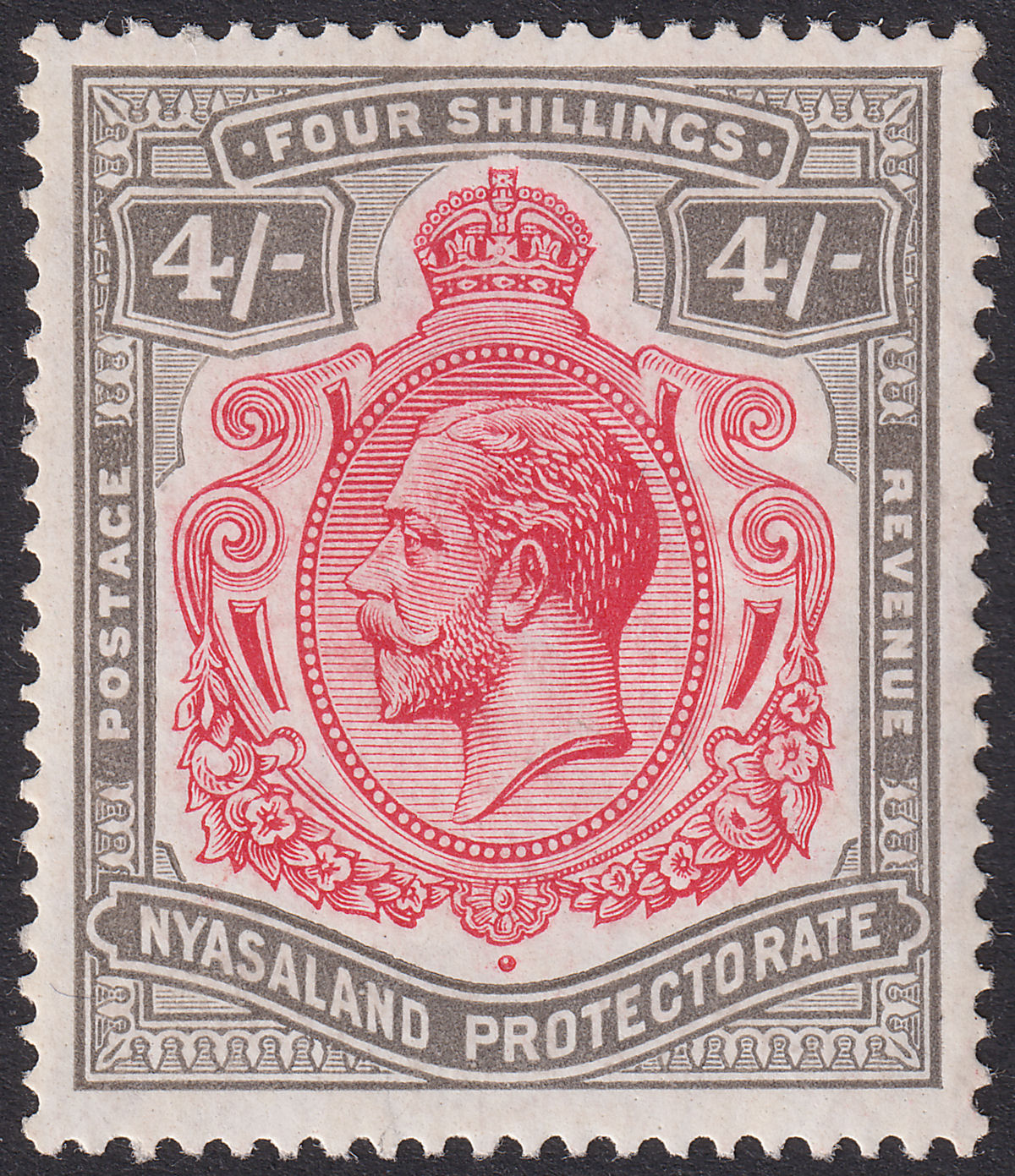 Nyasaland 1927 KGV 4sh Carmine and Black Mint SG111 cat £35