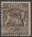 Click for more photos and details Rhodesia 1892 BSAC First Arms 1sh Grey-Brown Used SG4