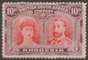 Click for more photos and details Rhodesia 1910 KGV Double Head 10d Scarlet and Reddish Mauve Mint SG149 cat £50