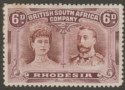 Click for more photos and details Rhodesia 1910 KGV Double Head 6d Red-Brown and Mauve Mint SG144 adhesion tones