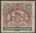Click for more photos and details Rhodesia BSAC 1897 Revenue Arms £30 Brown and Green Used with Date perfin BF11a