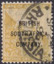 Rhodesia 1896 QV BSAC COGH Overprint 1sh Yellow-Ochre Used SG64 cat £150 CREASE