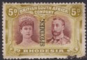 Click for more photos and details Rhodesia 1910 KGV SPECIMEN Double Head 5d Prp-Brn + Ol-Yl Mint SG141as DAMAGED
