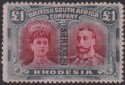 Rhodesia 1910 KGV SPECIMEN Double Head £1 Crims + Sl-Blk Mint SG166as Extra Curl