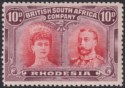 Click for more photos and details Rhodesia 1910 KGV Double Head 10d Scarlet and Reddish Mauve Mint SG149 cat £55