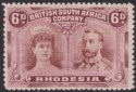 Click for more photos and details Rhodesia 1910 KGV Double Head 6d Red-Brown and Mauve Mint SG144 cat £65