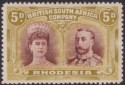 Click for more photos and details Rhodesia 1910 KGV Double Head 5d Purple-Brown + Olive-Yellow Mint SG141a cat £60