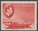 Click for more photos and details Seychelles 1938 KGVI Pirogue 5r Red Chalky Mint SG149