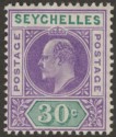 Click for more photos and details Seychelles 1906 KEVII 30c Violet and Green with Variety Dented Frame Mint SG66a