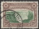 Click for more photos and details Southern Rhodesia 1935 KGV Vic Falls Postage and Revenue 2d p12½ Used SG35