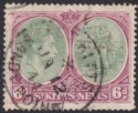 Click for more photos and details St Kitts-Nevis 1943 KGVI 6d Green & Deep Claret p14 Used w SANDY POINT Postmark