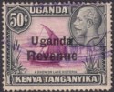 Click for more photos and details Uganda 1935 KGV Revenue Overprint 50c Bright Purple and Black Used BF102